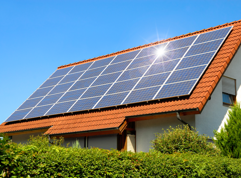 Solar panel on a red roof